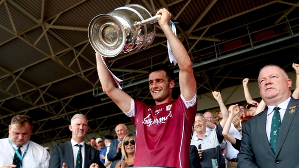 David Burke lifts the Bob O'Keeffe Cup after victory over Kilkenny