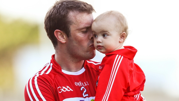 Cork's James Loughrey with his daughter Aoibhe after the game