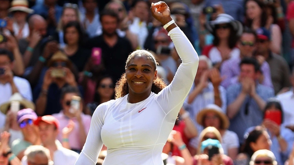 Serena Williams salutes the crowd after her victory