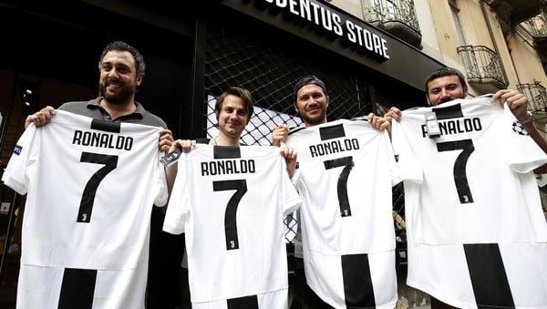 Put your shirt on him: Juventus fans show off their new purchases (€104.95 a pop)