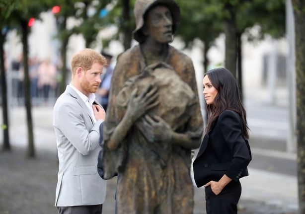 Prince Harry, Duke of Sussex and Meghan, Duchess of Sussex view the famine memorial on the bank of the River Liffey 