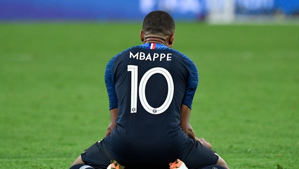 Football's coming home to the banlieues: Kylian Mbappe celebrates at the end of the semi-final against Belgium. Photo: Christophe Simon AFP/Getty Images