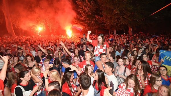 Croatia fans in Split celebrate after beating England and advancing to their first ever World Cup final. Photo: Anadolu Agency/Getty Images