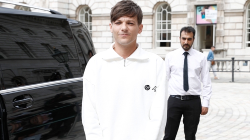 Louis Tomlinson arrives at the X Factor press conference on Tuesday