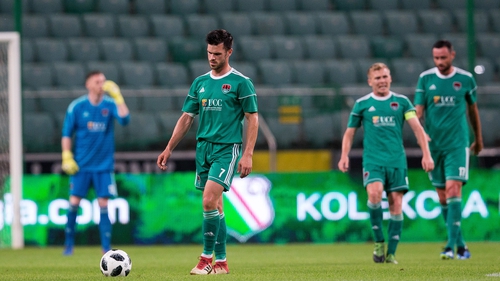 Jimmy Keohane and his Cork City team-mates dejected after conceding the opening goal against Legia Warsaw