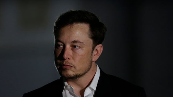 Elon Musk owns about a fifth of Tesla