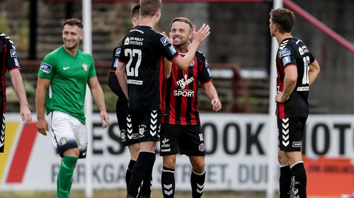 Daniel Kelly celebrates his second goal with Keith Ward