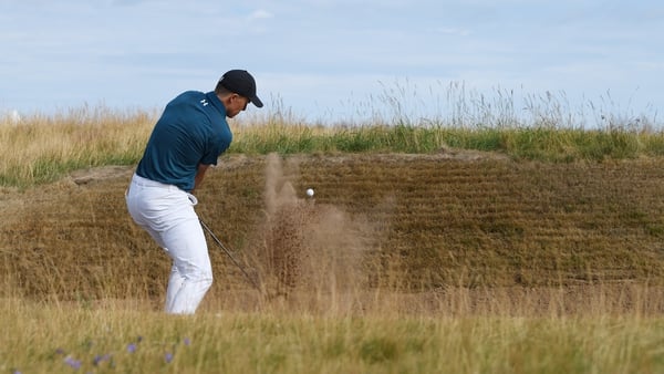 Jordan Spieth hits a bunker shot during the third round of the 147th Open Championship at Carnoustie