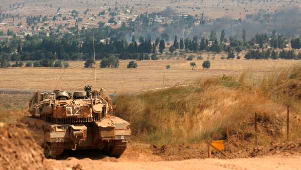 File image of an Israeli Merkava tank on the border between Israel and Syria
