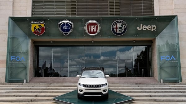 Fiat Chrysler said its net profits slid by nearly a fifth last year