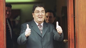A jubilant thumbs-up as he arrives for a meeting with Tony Blair and David Trimble in May 1998 during the peace referendum