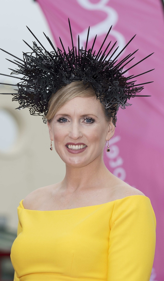 Tara Lally shone in yellow. We love that she chose a black hairpiece to stand out from the crowd.