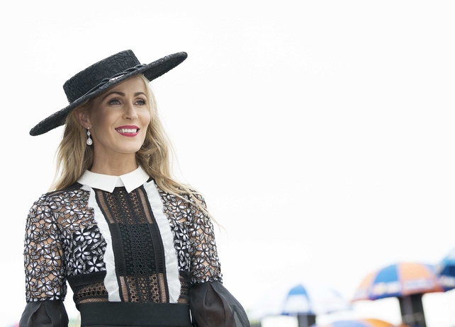Mary Lee Gort chose a flat black hat to go with her sheer dress.