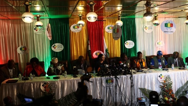 Zimbabwe Electoral Commission officials announce the results of the election during a press conference in Harare