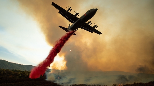 An air tanker drops retardant on the Ranch Fire, part of the Mendocino Complex Fire