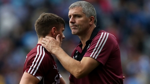 Kevin Walsh consoles Shane Walsh after the game