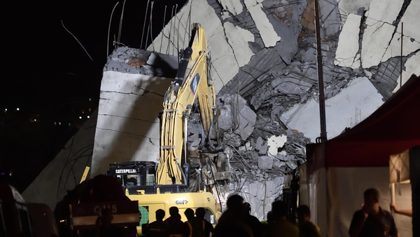 Rescuers are working into the night following the collapse