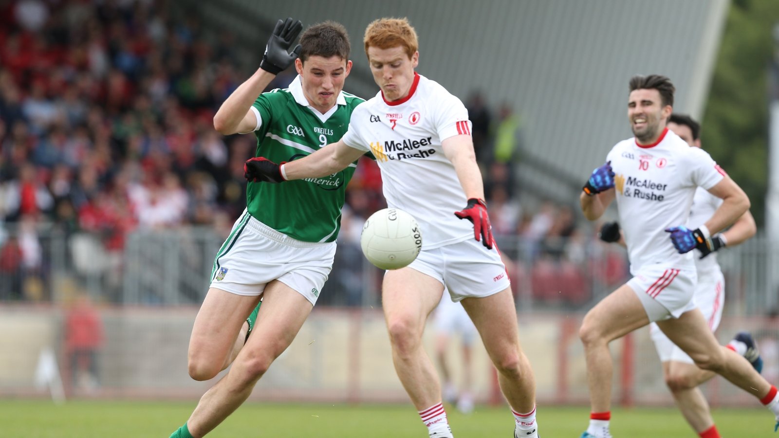 Image - Gearoid Hegarty attempts to tackle Tyrone's Peter Harte in the 2015 All-Ireland football qualifier
