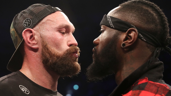 The fighters eye each other up in the ring