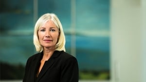 Ulster Bank Chief Executive, Jane Howard, says the bank has no plans to merge with Permanent TSB