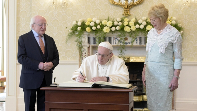 The Pope becomes the latest world and religious leader to sign the visitor's book