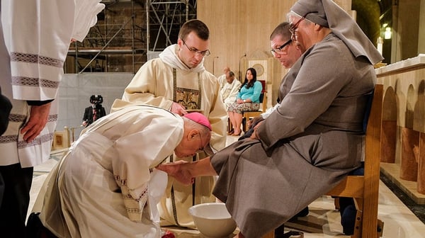 Archbishop Carlo Maria Vigano pictured in 2016 washing the foot of Sister Antonia Sanchez in Washington DC