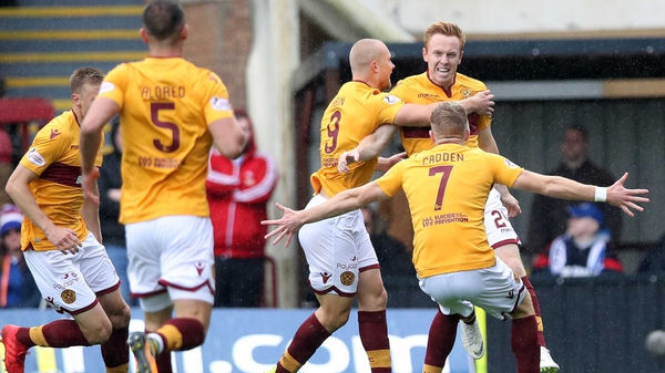 Motherwell rescued a point in a six-goal thriller