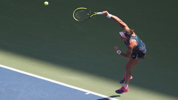 Caroline Wozniacki is through to the second round at the US open