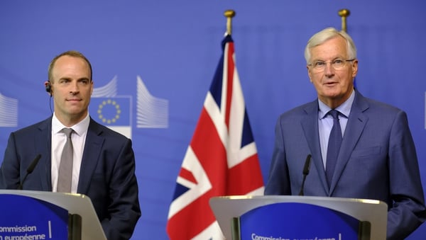 Dominic Raab (L) and Michel Barnier held talks in Belgium today