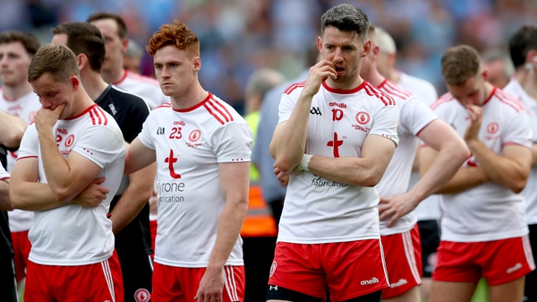 Tyrone players show their disappointment after the final
