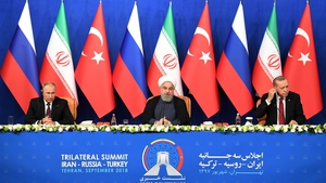 Vladimir Putin, Hassan Rouhani and Recep Tayyip Erdogan at a press conference after meeting on Syria in Tehran