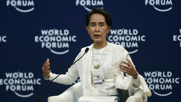 Myanmar's de facto leader Aung San Suu Kyi also defended a court decision to jail two Reuters reporters