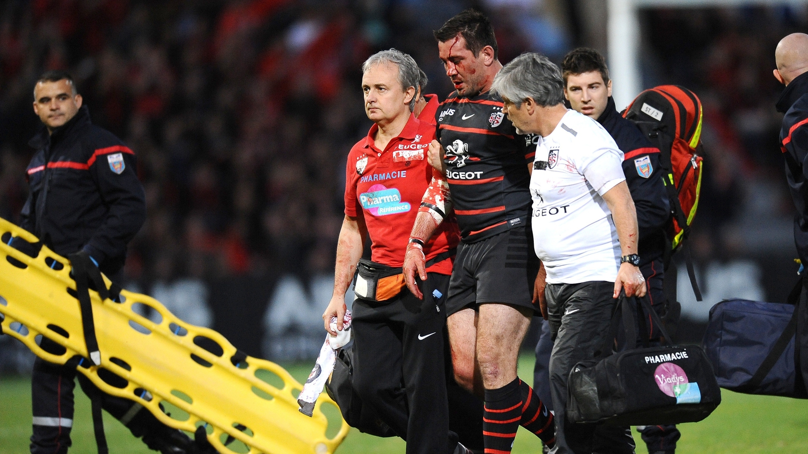 Image - Florian Fritz taken off the pitch in a 2014 match against Racing Metro - he returned to play later