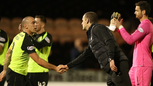 Scott Brown of Celtic and St Mirren boss Oran Kearney shake hands after the game