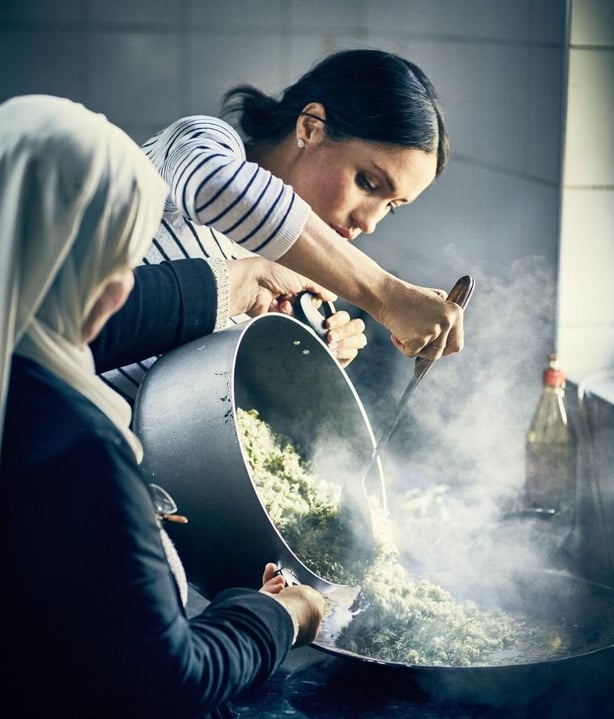 Duchess of Sussex cooking with women in the Hubb Community Kitchen at the Al Manaar Muslim Cultural Heritage Centre (Jenny Zarins/PA)