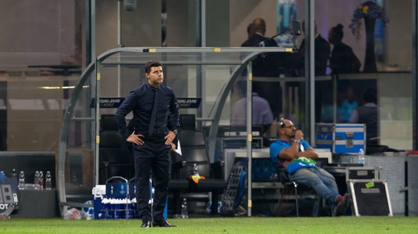 Mauricio Pochettino dejected as his side crumble in Milan