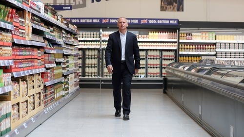 Tesco's chief executive Dave Lewis said he plans to step down next summer
