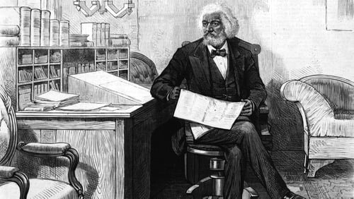 Frederick Douglass edits a journal at his desk, late 1870s. Photo: Hulton Archive/Getty Images