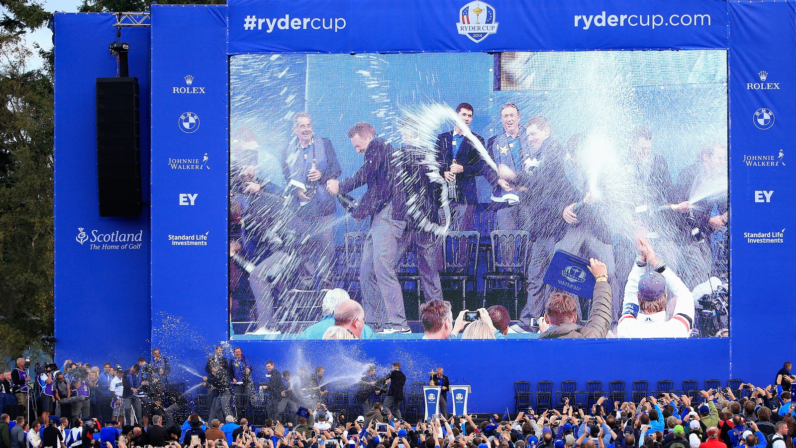 Image - Paul McGinley drenched in champagne following his successful 2014 captaincy