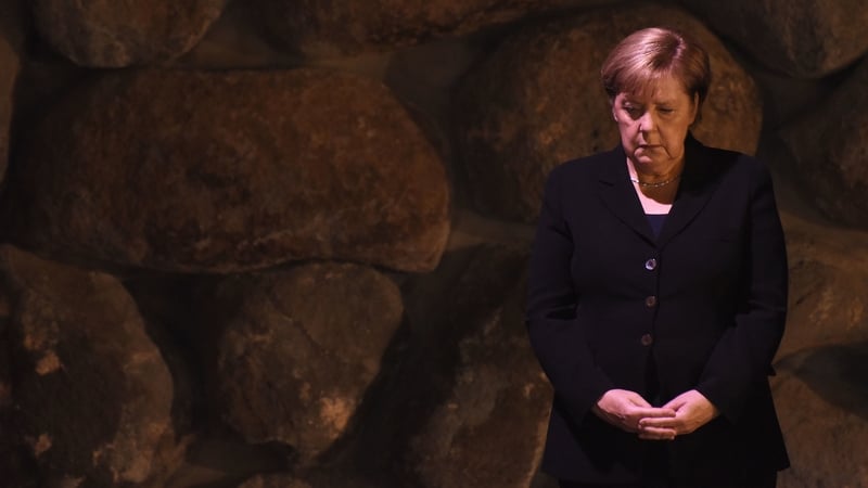German Chancellor Angela Merkel takes part in a memorial ceremony in the Yad Vashem Holocaust Museum in Jerusalem