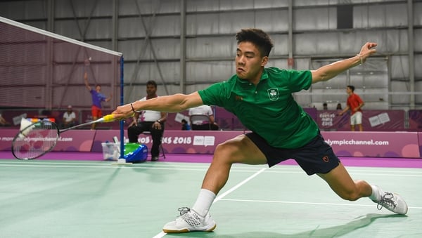Nhat Nguyen on his way to an opening win in the badminton singles