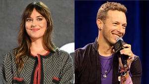 Dakota Johnson has laughed off rumours that she's pregnant with Chris Martin's child