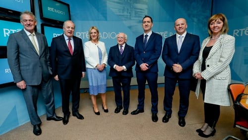 Peter Casey, Gavin Duffy, Liadh Ní Riada, Michael D Higgins, Seán Gallagher and Joan Freeman with presenter Cormac Ó hEadhra