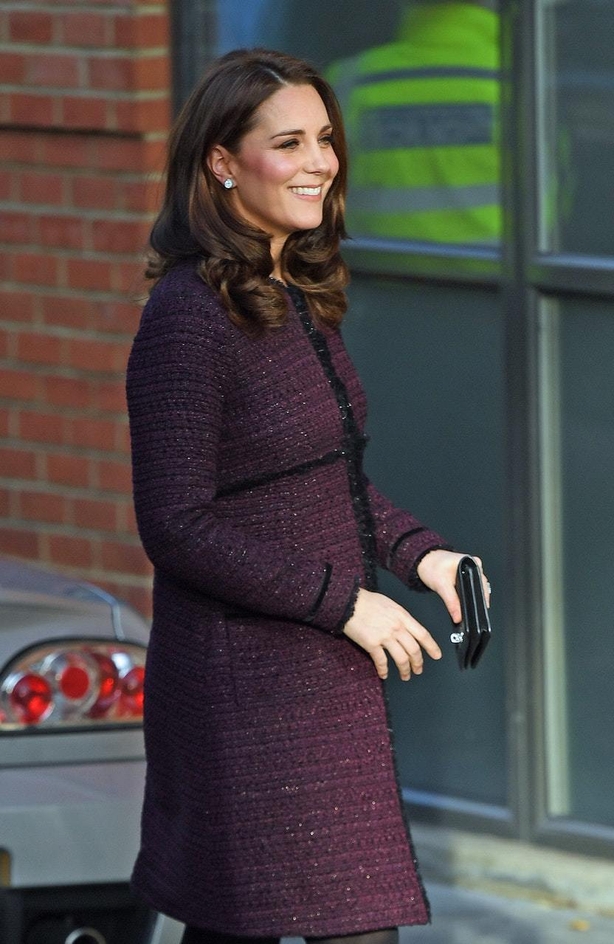 The Duchess of Cambridge wearing a Seraphine coat at the Rugby Portobello Trust community centre in North Kensington, London (Victoria JonesPA)