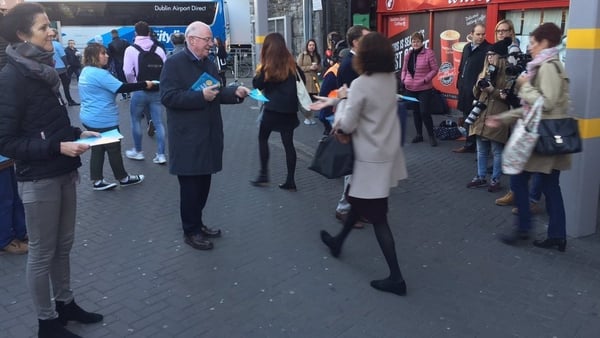 Charlie Flanagan handing out leaflets this morning