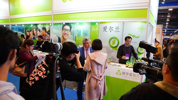 Minister John Halligan being interviewed at the Education Fair in Beijing