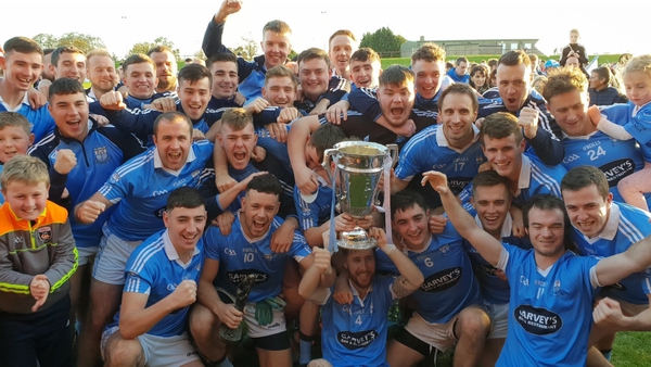 Newtown Blues celebrate with the cup. Pic: @LouthGAA
