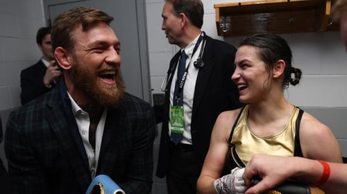 Conor McGregor and Katie Taylor share a joke at the weekend