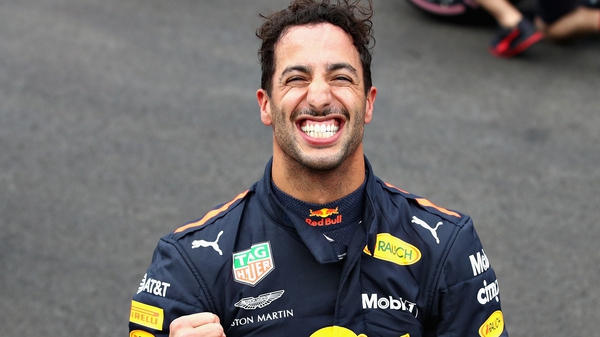 Daniel Ricciardo celebrates taking pole