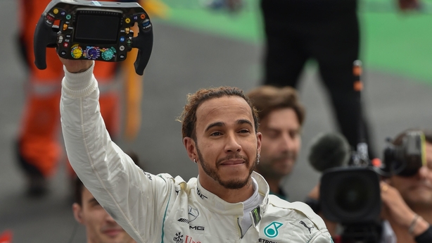  Hamilton wins fifth F1 title to draw level with Fangio